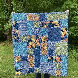 NWT. Hand Crafted Blue Butterflies Lap Quilt